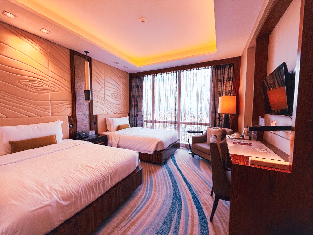 Deluxe double bed with a city view